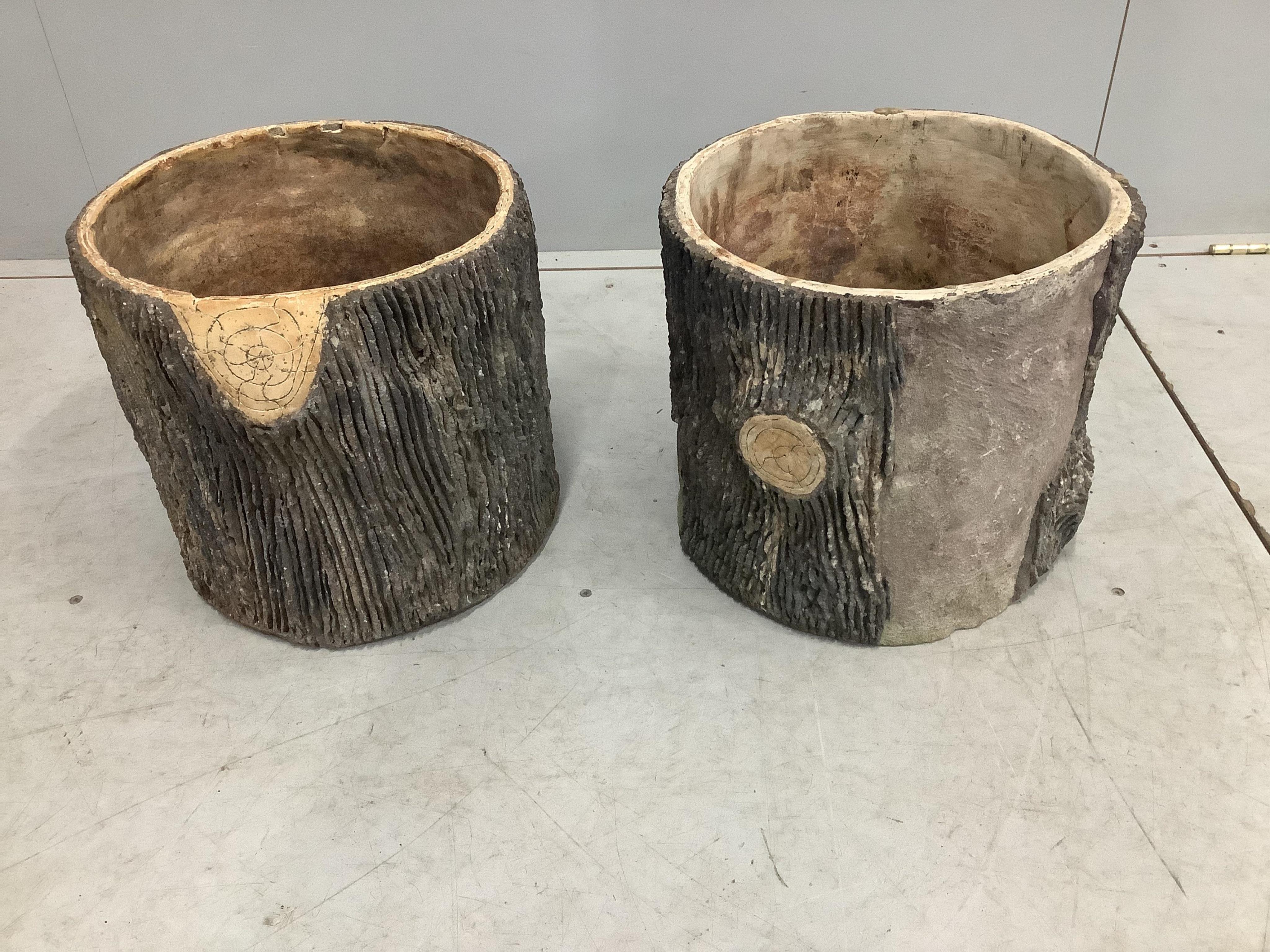 A pair of circular earthenware log effect planters, diameter 33cm, height 32cm. Condition - fair